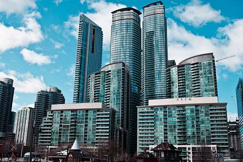 city green and gray building during daytime town