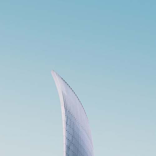 urban high-rise building under clear blue sky city