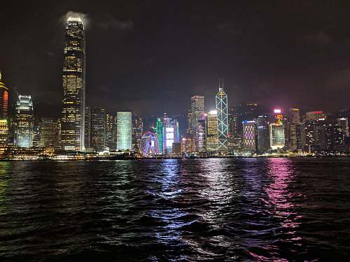 city high-rise buildings during nighttime metropolis