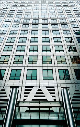 city high-rise gray concrete building during daytime architecture