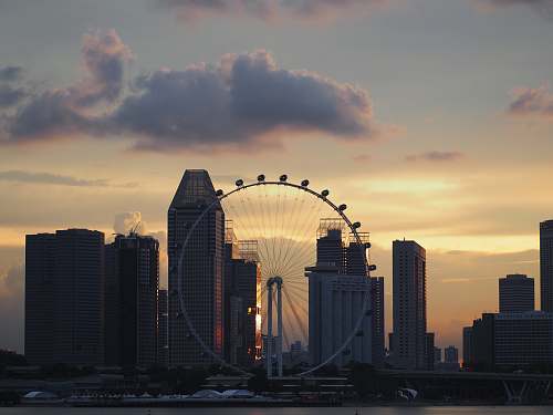 architecture landscape photography of ferris wheel at daytime singapore