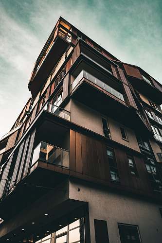 city low angle photography of brown concrete building office building