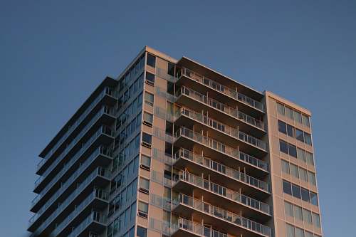 condo low angle photography of building housing