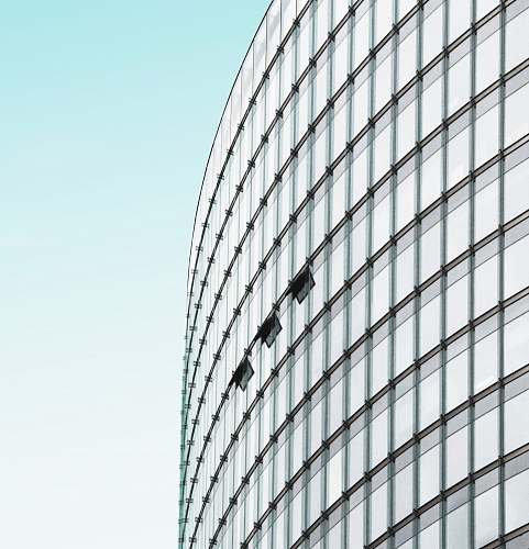 berlin low-angle photography of building under clear blue sky skyscraper