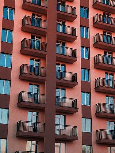 city maroon and brown painted building town