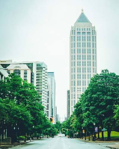 city road between buildings town