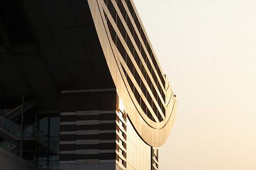 architecture The facade and roof of a modern building in bright sunlight structure