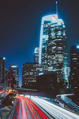 city time lapsed photography of vehicles beside buildings urban