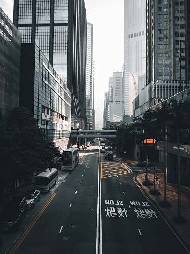 urban vehicle parked near building road