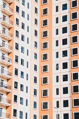 city white and yellow concrete building during daytime high rise