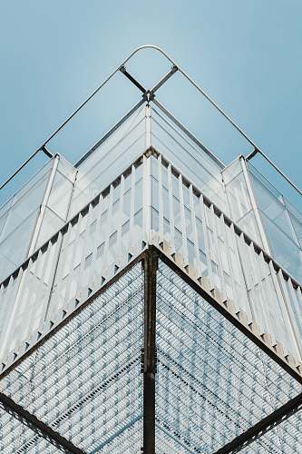belgium white high-rise building with blue sky louvain-la-neuve