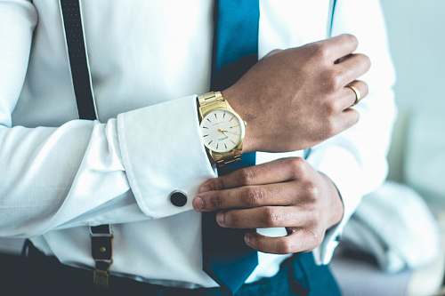 watch person wearing white dress shirt men