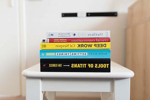 book several books on top of table inside room gouda