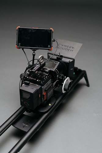 display black flat screen monitor attached to camera on rail machine