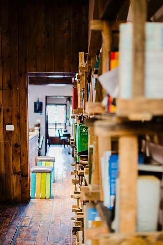 books brown wooden rack in shallow photography book