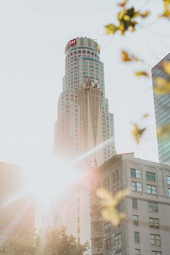 building golden hour photography of high-rise building demolition