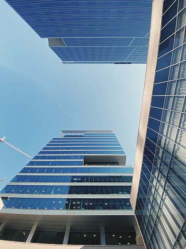 building gray and blue glass panel building office building