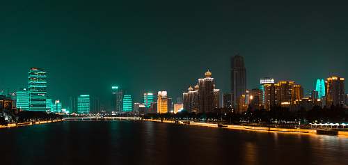 building high rise buildings near body of water metropolis
