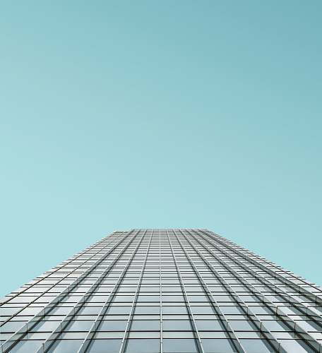 architecture low angle photography of glass building skyscraper