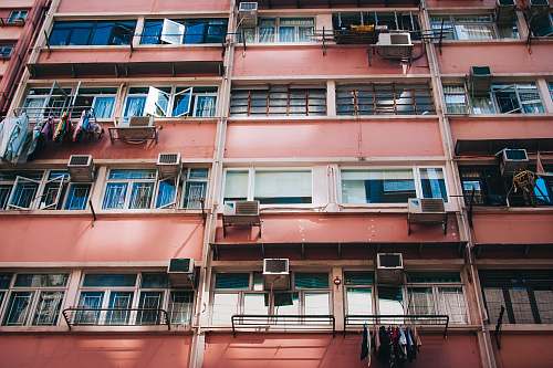 urban low-angle photography of red building building