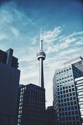 urban needle tower during daytime architecture