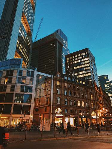 building people beside building downtown