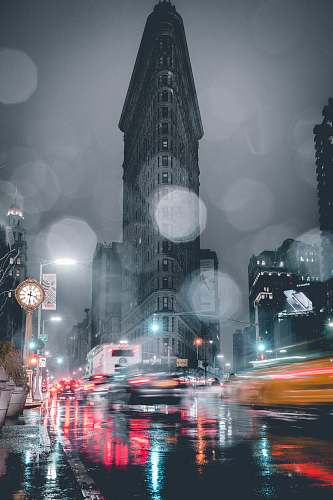 building time lapse photography of vehicles on road urban