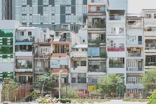 building white concrete buildings high rise