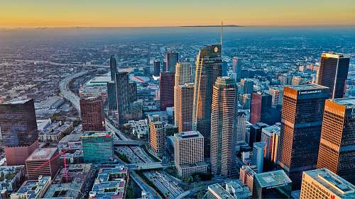 building wide-angle photography of high-rise buildings during daytime town