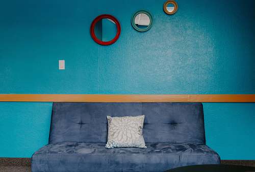 shoe blue 3-seat sofa with throw pillow footwear