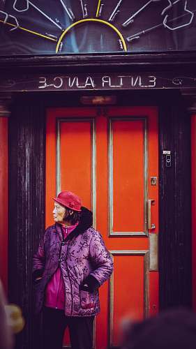 apparel selective focus photography of woman in pink leather jacket person