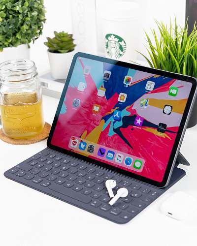 computer turned-on black tablet computer with keyboard tablet computer