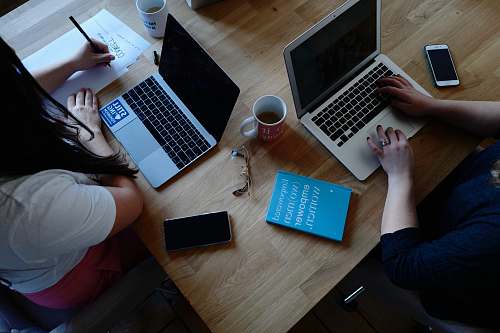 computer two person using laptops pc