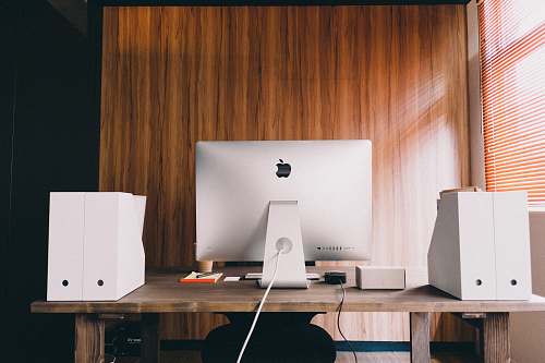 table silver Apple iMac desk
