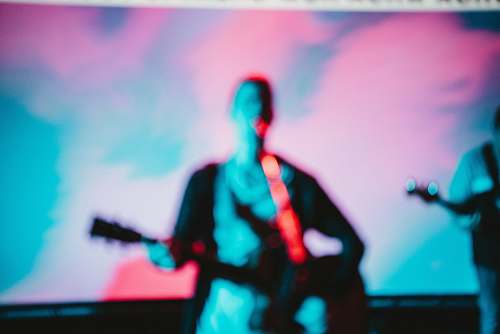 guy man playing guitar screengrab performer