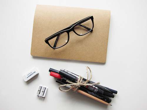 accessories black sunglasses and black pens accessory