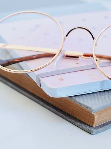 book eyeglasses on book work