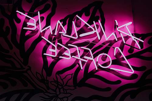 neon pink and black textile with text overlay pink lane coffee