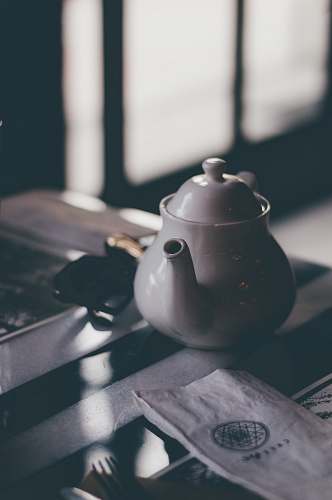 pot white ceramic teapot on table pottery