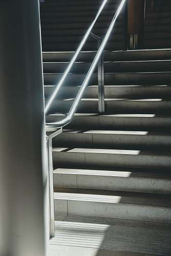 banister gray concrete stairs staircase
