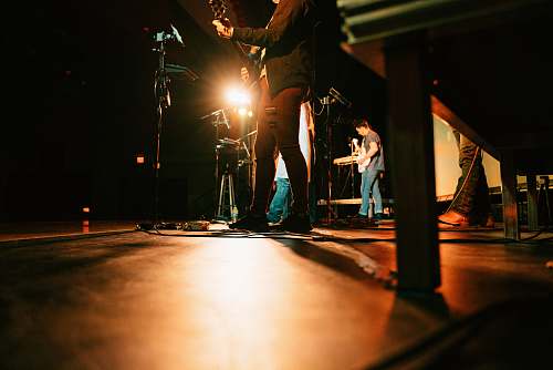 person band on stage at night musician