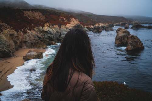 person landscape photo of a woman on a beach people