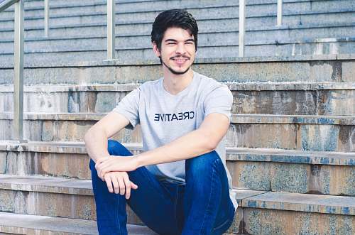 apparel man wearing gray crew-neck shirt clothing