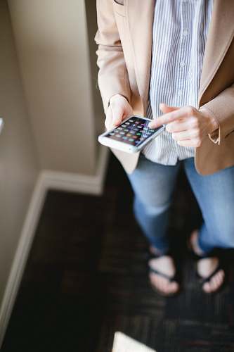 person person using smartphone inside room phone