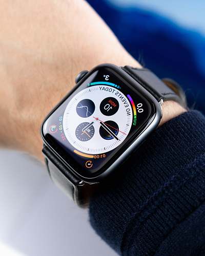 person space gray Apple watch with black leather strap wristwatch