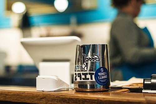 person stainless steel container wood