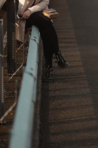 clothing woman on handrail apparel
