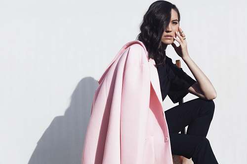 apparel woman wearing pink blazer clothing