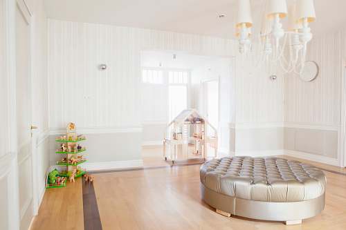 room round bed in middle of room with chandelier home