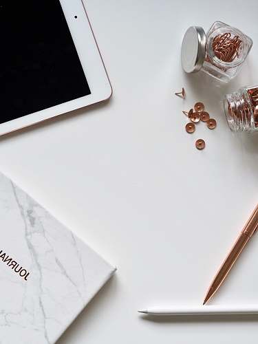 blog photo of thumbtacks near iPad desk